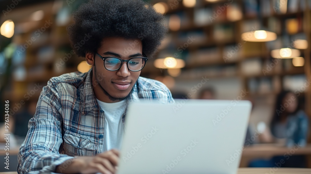A student studying through an online education platform on a laptop, with a virtual whiteboard and peer discussions in the background. A student studying through an online education platform on a laptop, with a virtual whiteboard and peer discussions in the background.