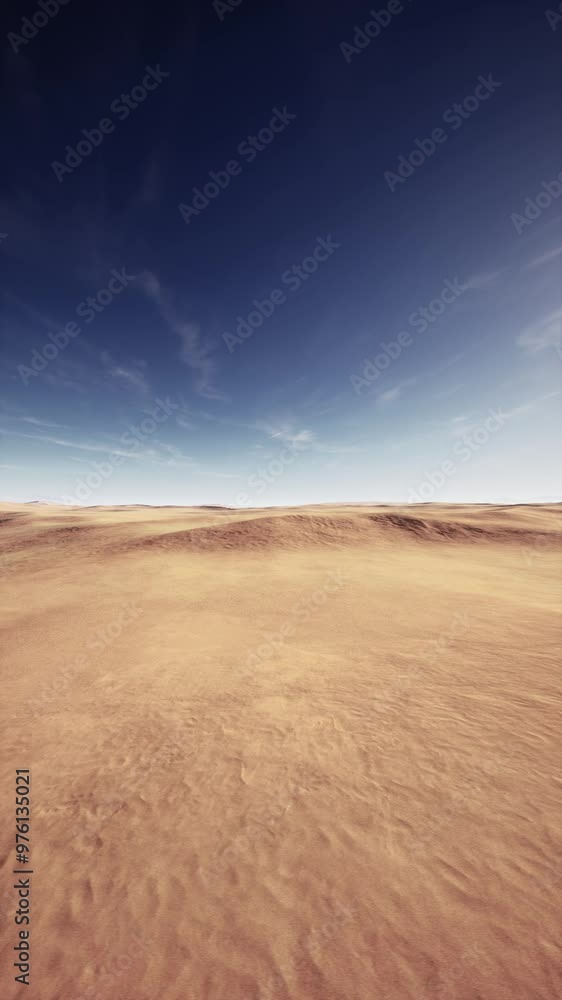 A wide shot of a desert expanse stretching under a clear blue sky, showcasing the arid terrain and vast horizon. A wide shot of a desert expanse stretching under a clear blue sky, showcasing the arid terrain and vast horizon.