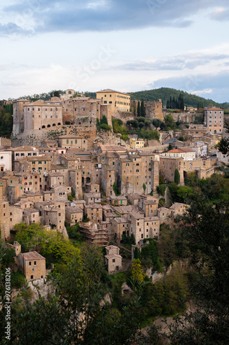 View of Sorano, an ancient medieval hill town composed of tuff stone over the Lente River. Etruscan town. Province Grosseto, Tuscany, Italy.