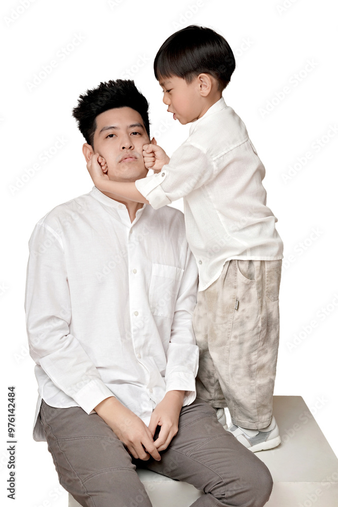 Jovial interaction between an adult father and a young boy, both in white shirts, creating a charming moment of bonding and playfulness. transparent PNG white background. Jovial interaction between an adult father and a young boy, both in white shirts, creating a charming moment of bonding and playfulness. transparent PNG white background.