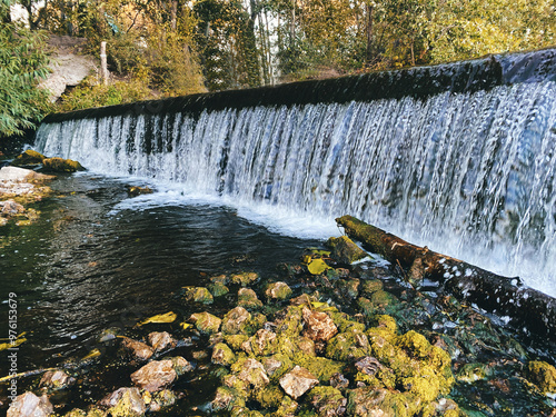 Background Lipetsk dam waterfall water flowing down the rocks  photo