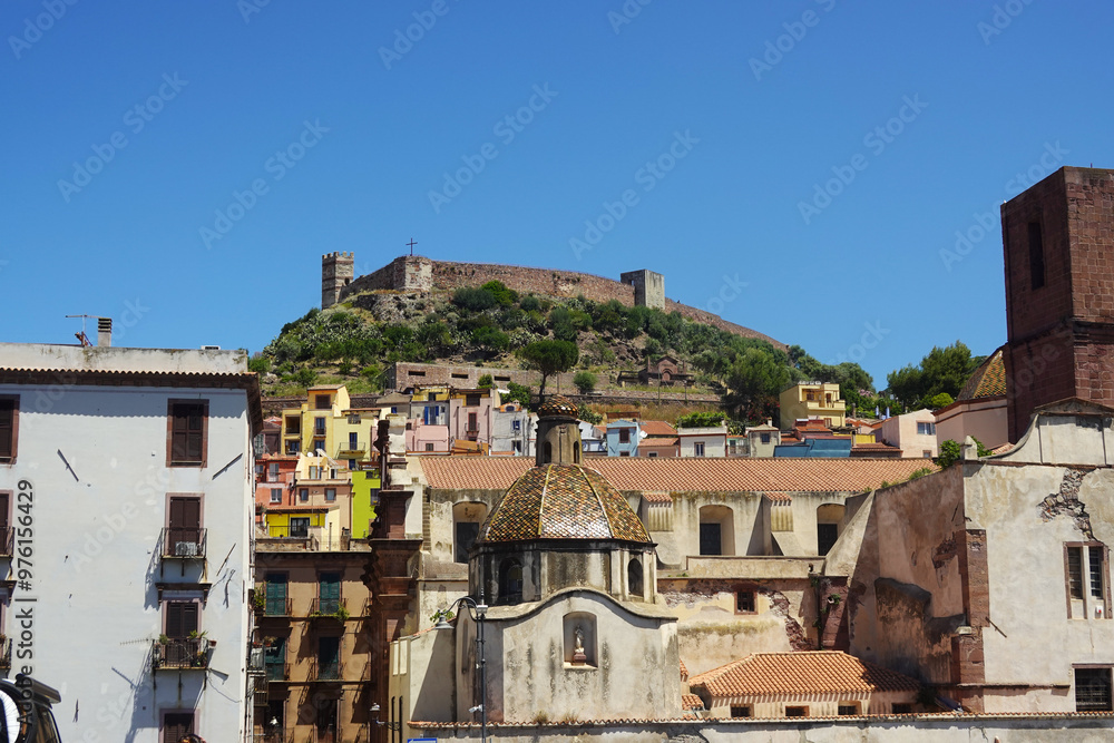 Bosa and its castle seen from the river Temo, Sardinia, Italy Bosa and its castle seen from the river Temo, Sardinia, Italy