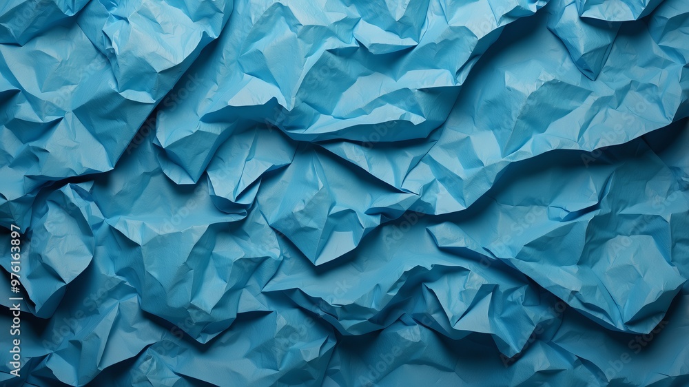 Fototapeta premium Vibrant Royal Blue Crinkled Paper Texture, Abstract Wrinkled Surface for Modern Editorial Design and Creative Packaging