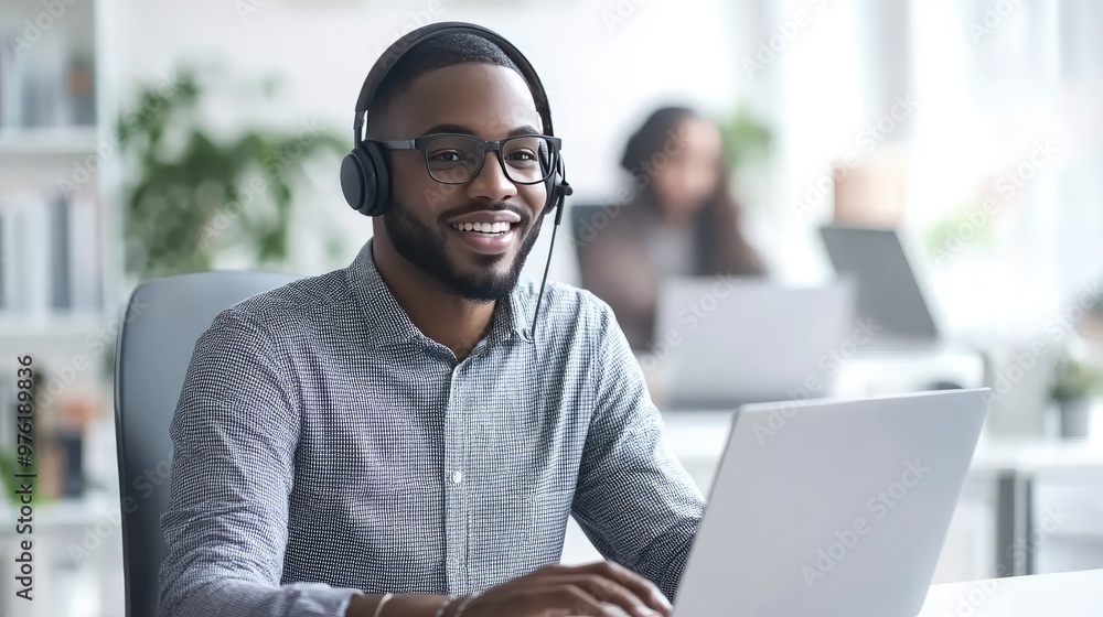 A call center agent wearing a tidy shirt and headphones, sincerely interacting with a customer in a white, modern office while using a laptop, highlighting professionalism. A call center agent wearing a tidy shirt and headphones, sincerely interacting with a customer in a white, modern office while using a laptop, highlighting professionalism.