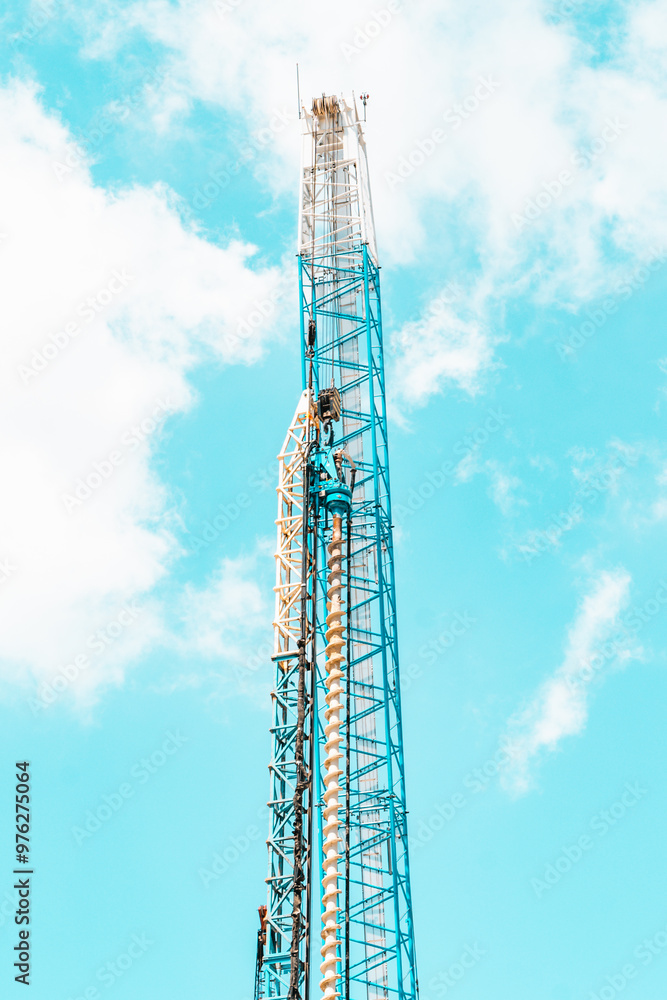 Cell tower with a view of the sky.