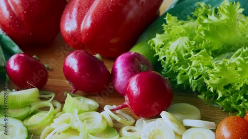 Vegetarian cuisine. Close up of kitchen table with organic vegetables assortment