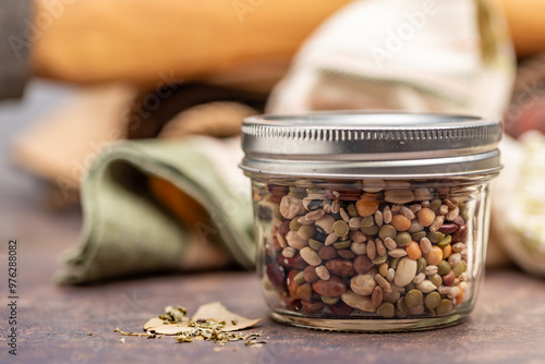 Variety of dried beans in a mason jar