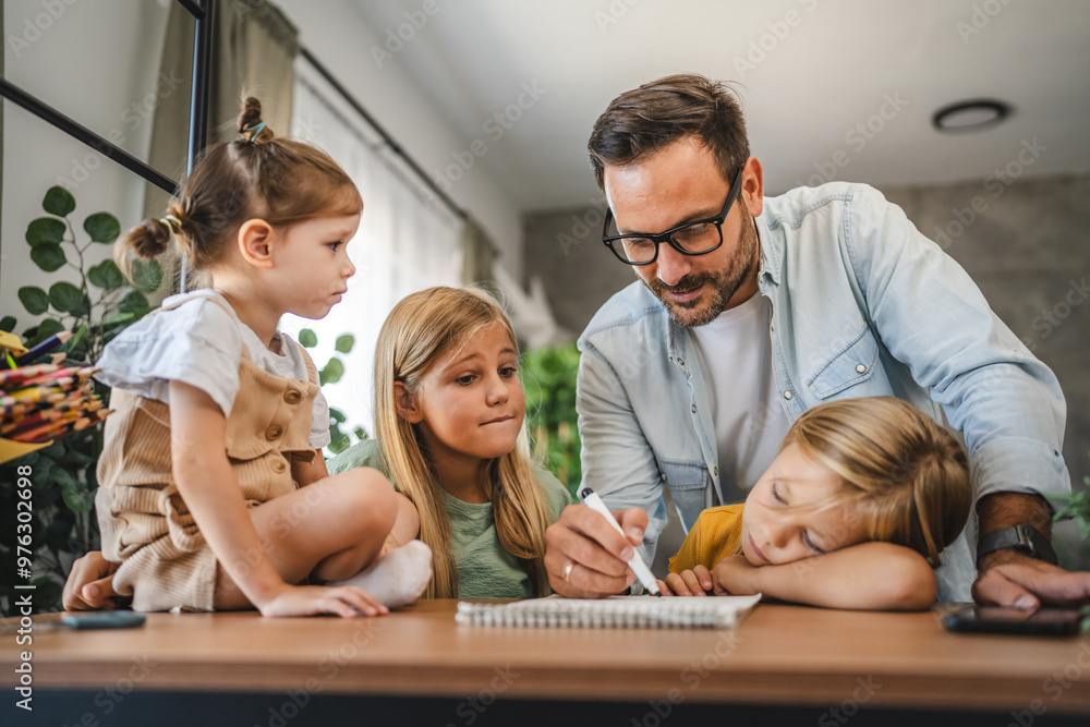 Adult single father of three daughters help them to do homework Adult single father of three daughters help them to do homework