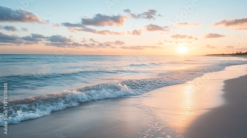 A beautiful sunset over the ocean as the sun sets on the horizon.