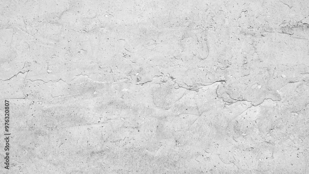 A grey wall with a few brush strokes on it. The wall is very plain and has no decoration A grey wall with a few brush strokes on it. The wall is very plain and has no decoration