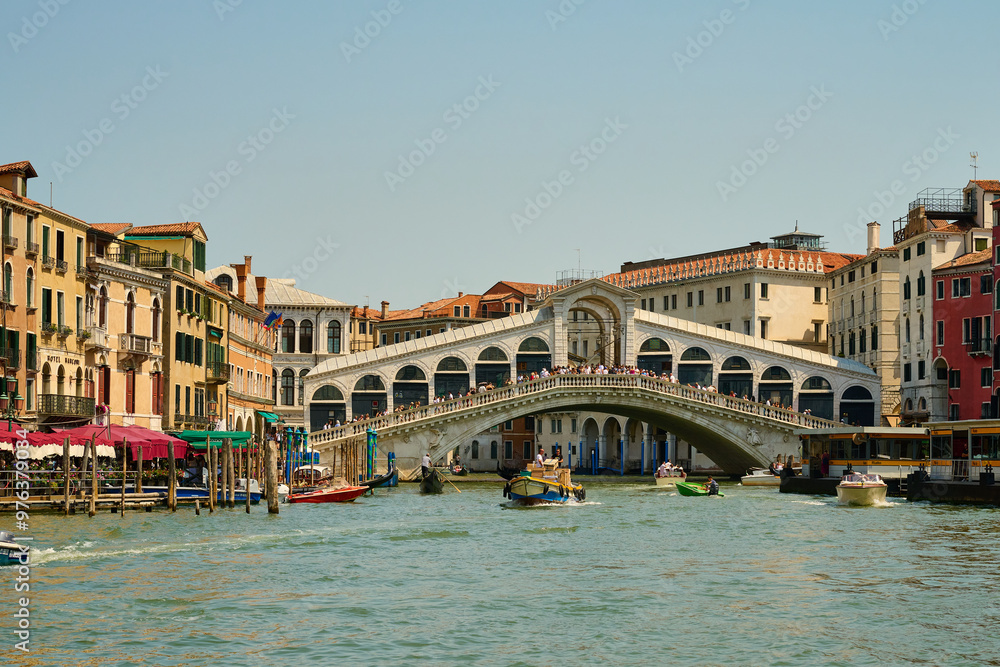 Obraz premium Venice and its buildings,canals,gondolas,and sculptures