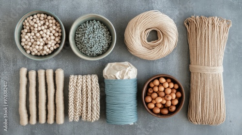 Craft supplies arranged on a white surface for creative projects in bright in...
