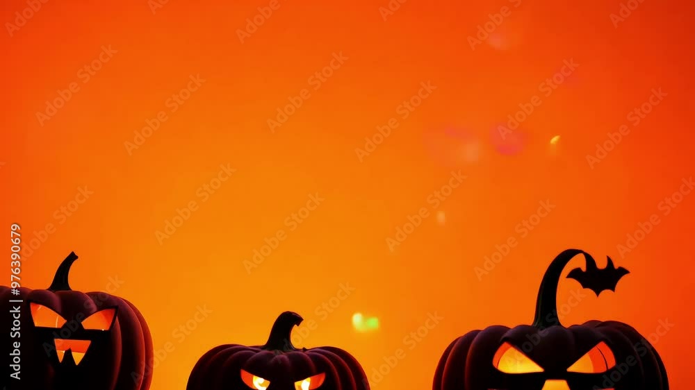Three glowing jack-o'-lanterns with sinister faces on an orange background, one featuring a bat-shaped stem, creating a spooky Halloween scene Three glowing jack-o'-lanterns with sinister faces on an orange background, one featuring a bat-shaped stem, creating a spooky Halloween scene