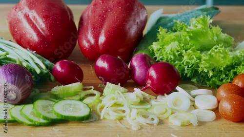Organic nutrition concept. Close up of assorted fresh natural vegetables on kitchen table