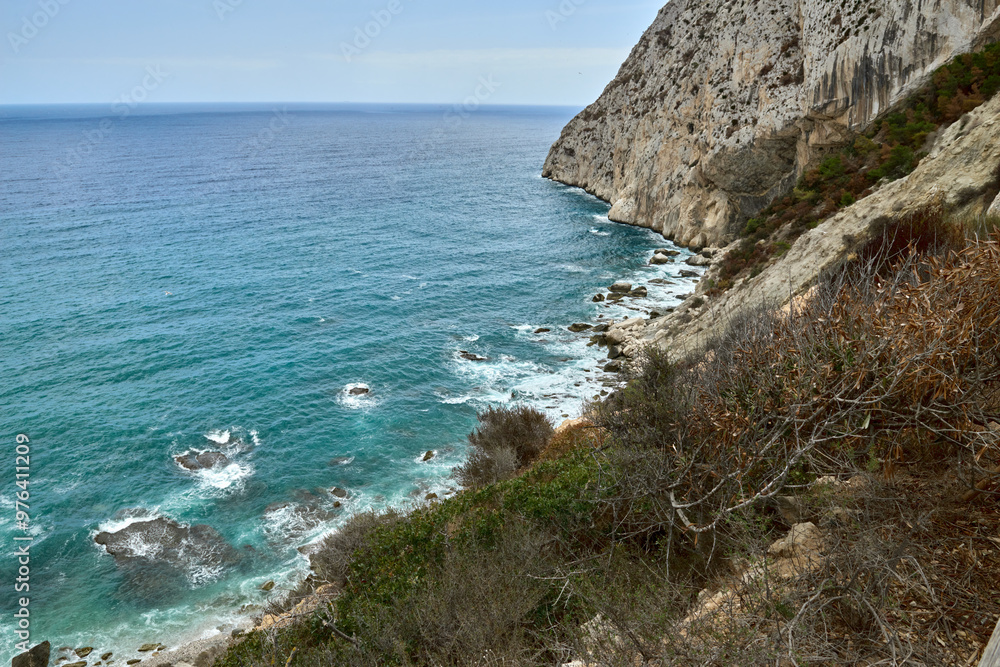 Idyllic Seaside Retreat Featuring Dramatic Coastal Cliffs Crystal Clear Waters Rolling Waves Pristine Beach Sunny Mediterranean Day Idyllic Seaside Retreat Featuring Dramatic Coastal Cliffs Crystal Clear Waters Rolling Waves Pristine Beach Sunny Mediterranean Day