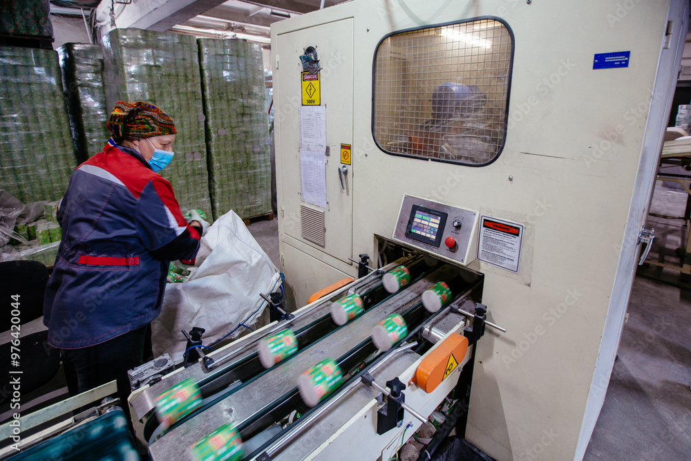 Toilet paper production line. Rolls of toilet paper on conveyor Toilet paper production line. Rolls of toilet paper on conveyor