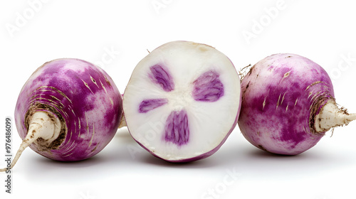 Fresh purple turnips cut in half, showcasing vibrant interior patterns. Perfect for healthy eating and vegetable recipes.