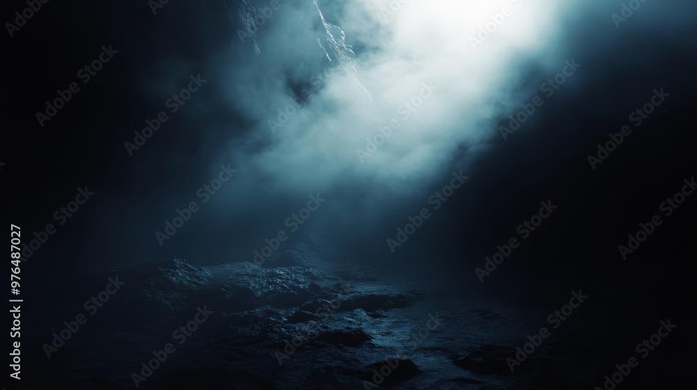 A dark, misty landscape with a bright light in the distance. A dark, misty landscape with a bright light in the distance.