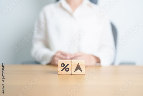 wood block of percentage change to UP and Down arrow. Interest rate, GDP, stocks market, financial, deflation and Inflation, ranking, mortgage, debt, Loan and Economic Recession concept