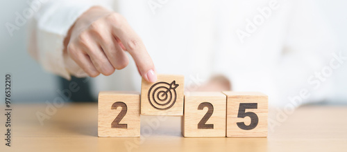 Wallpaper Mural 2025 year block with dartboard icon. Goal, Target, Resolution, strategy, plan, Action, mission, motivation, and New Year start concepts Torontodigital.ca