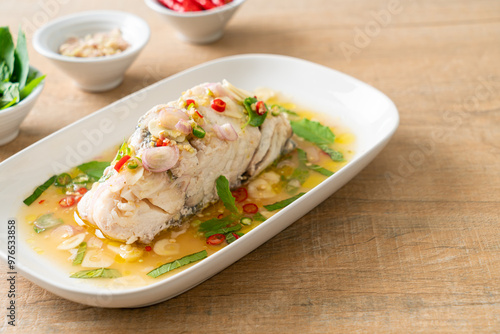 steamed sea bass fish with herbs