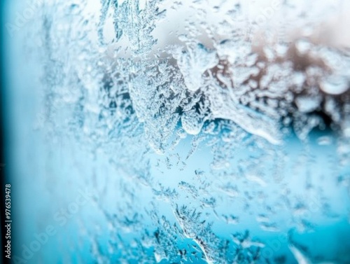 Delicate Ice Patterns on Frosted Window Against Deep Blue Background