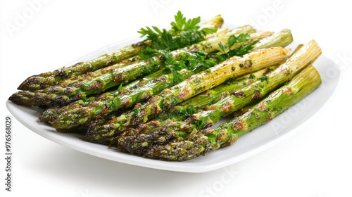 Cooked asparagus on a white plate
