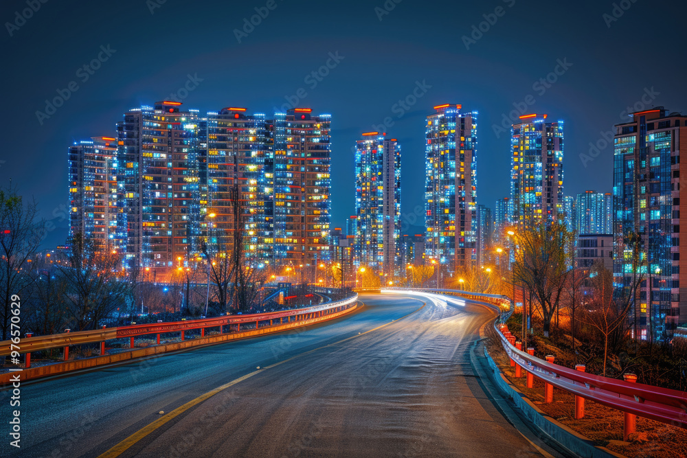 At night, the light trajectory of the taillights of fast-moving vehicles on city roads At night, the light trajectory of the taillights of fast-moving vehicles on city roads