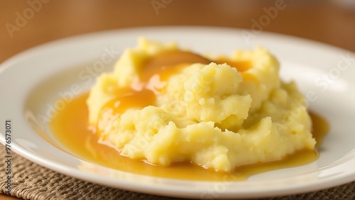 A dish of creamy mashed potatoes with a