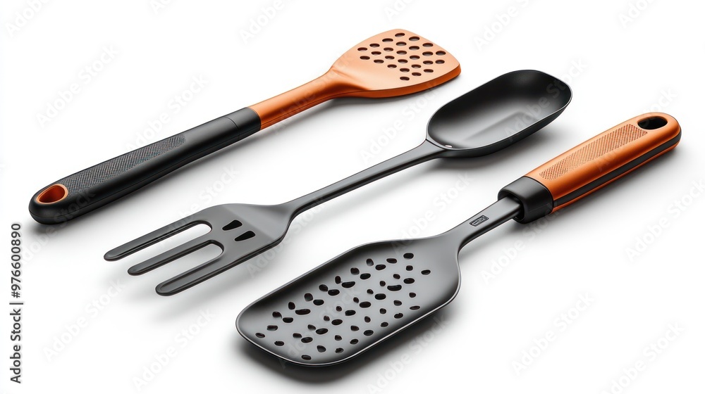 Three kitchen utensils for cooking and serving food. Three kitchen utensils for cooking and serving food.