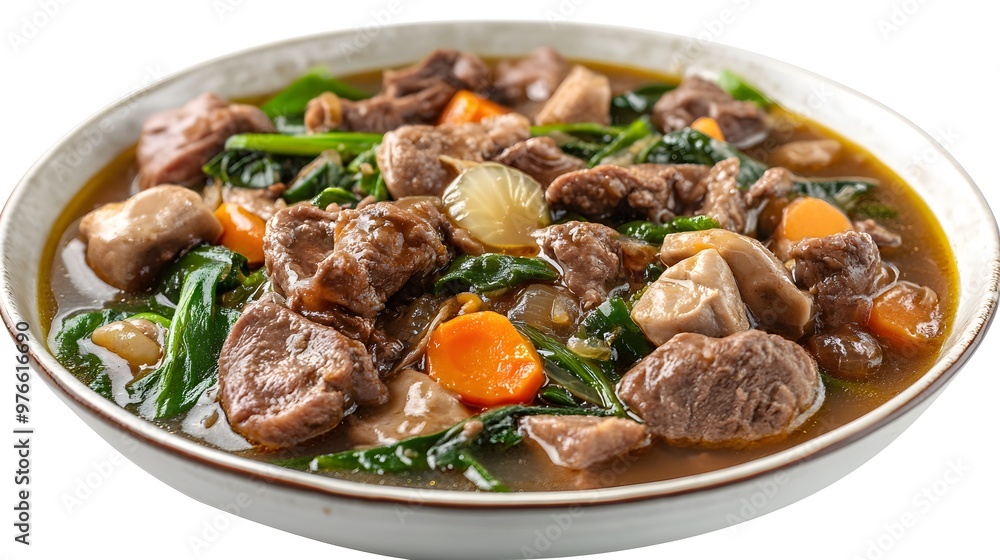Hearty beef stew with spinach and carrots in rich broth Hearty beef stew with spinach and carrots in rich broth