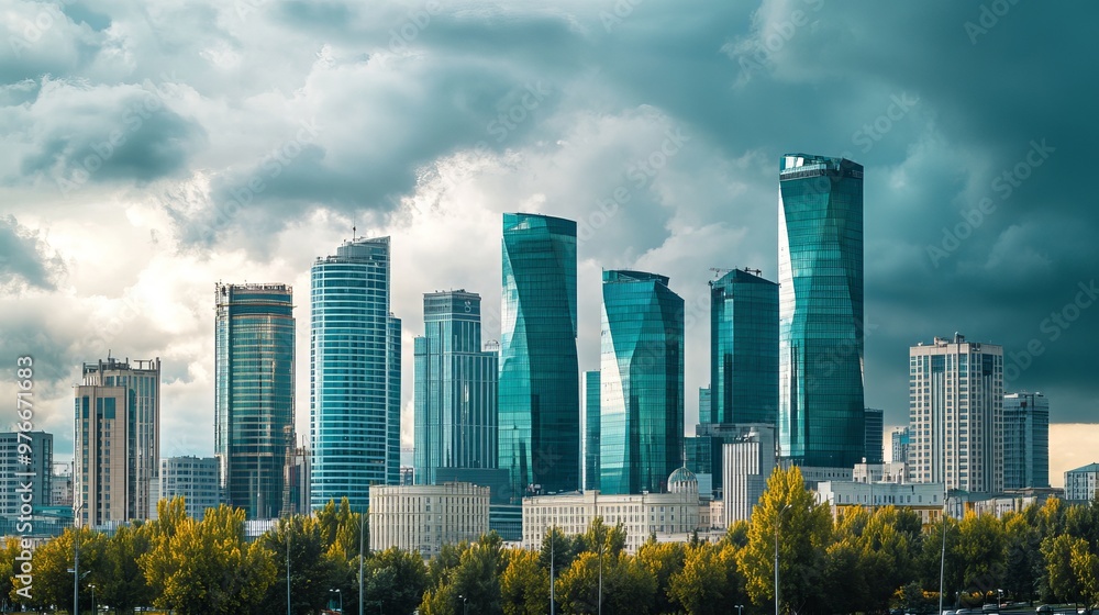 Fototapeta premium In September 2019, the downtown of Astana, Kazakhstan, features a variety of skyscrapers and government buildings set against a cloudy sky. 
