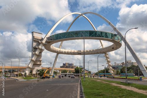 The famous Biswa Bangla Gate, an amusement center at Rajarhat, along with view of morning traffic on the city road at Kolkata, India