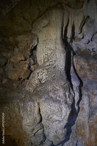 Cave in the limestone mountains photo