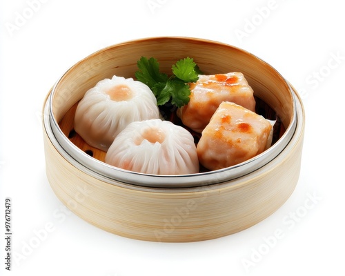 Delicious dim sum served in a bamboo steamer, featuring shrimp dumplings and pork siu mai, garnished with cilantro. photo