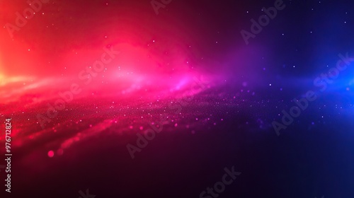 Vibrant abstract background featuring a blend of pink and blue hues with glowing particles, perfect for digital design projects.