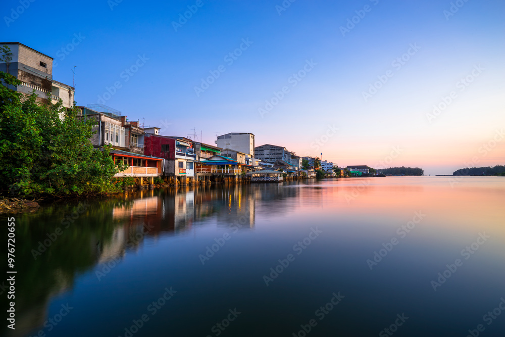 People's houses along the Bang Nara River Narathiwat Province, Thailand. People's houses along the Bang Nara River Narathiwat Province, Thailand.