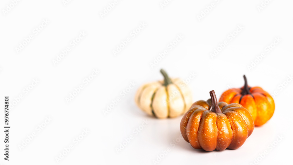 Obraz premium Colorful Pumpkin Group on white background copy space horizontal