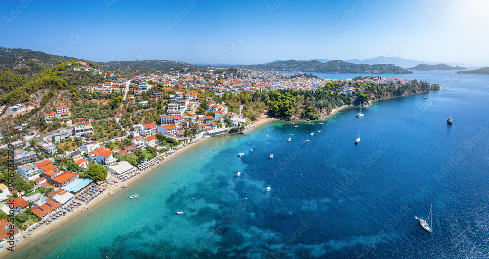 Fototapeta premium Aerial view of the beach at Megali Ammos next to the town of Skiathos island, Sporades, Greece