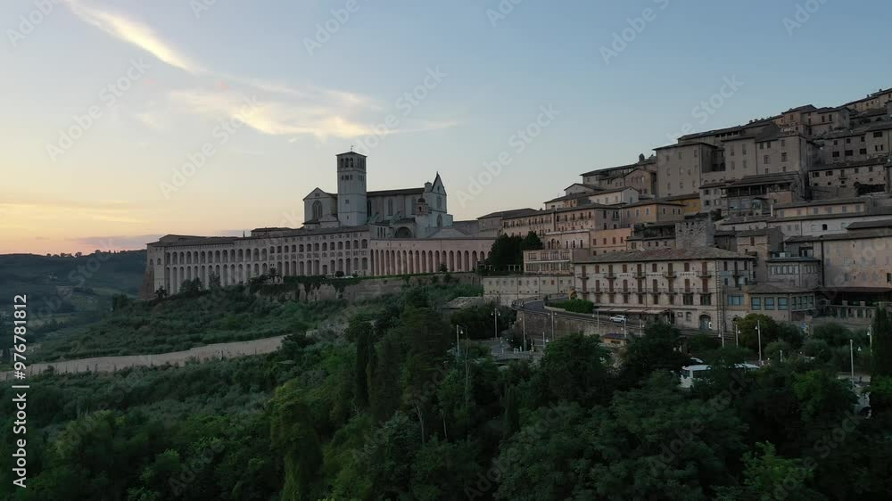 Aerial view of the city center and the Basilica of San Francesco d'Assisi in summer at sunset, Perugia, Italy, Europe Aerial view of the city center and the Basilica of San Francesco d'Assisi in summer at sunset, Perugia, Italy, Europe