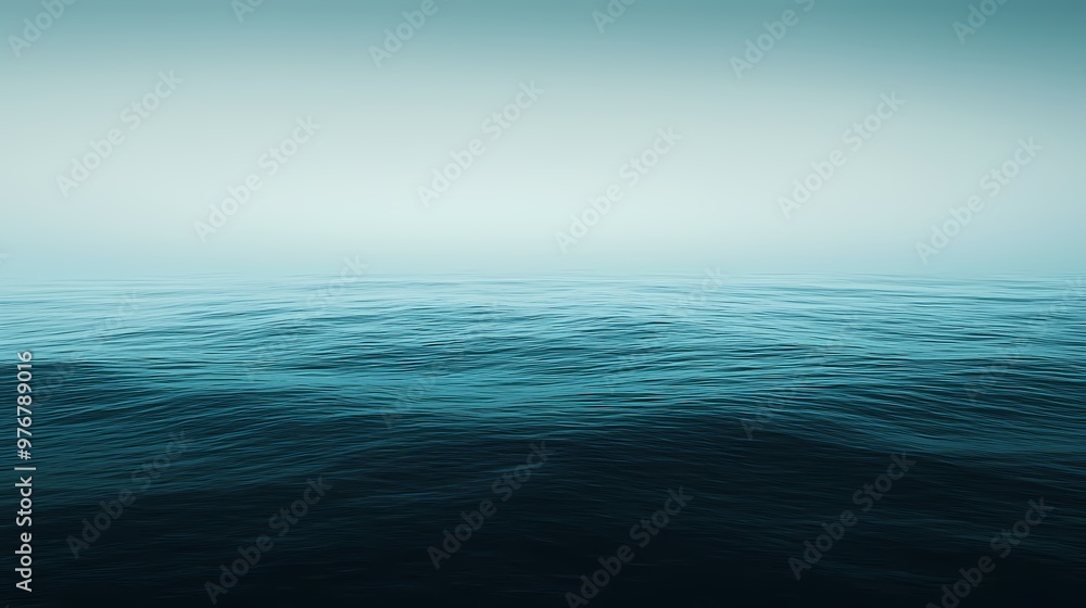Obraz premium A Tranquil Seascape: Gentle Blue Waves Fade Into the Soft Horizon Beneath the Calm Sky, Evoking Serenity and Peace at Sea