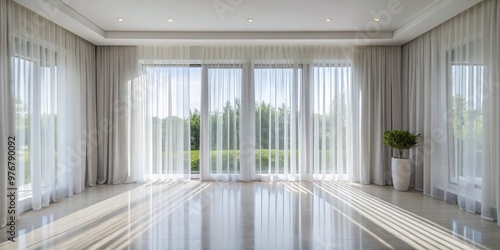 Dainty white curtains dangle elegantly from sleek tracks, refracting sunlight and casting a warm glow on the