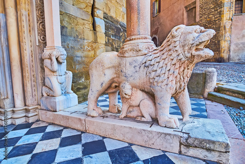 The lion and telamon sculptures, Porta dei Leoni Bianchi, Basilica of Santa Maria Maggiore, Bergamo, Italy photo