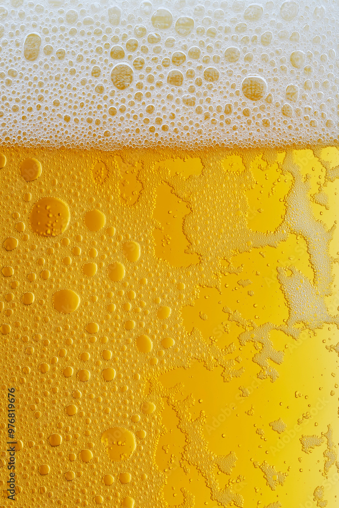 Beer texture. Close-up of beer with foam on top Beer texture. Close-up of beer with foam on top