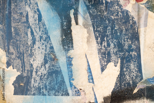 Torn and ripped street poster background. Messy weathered paper collage