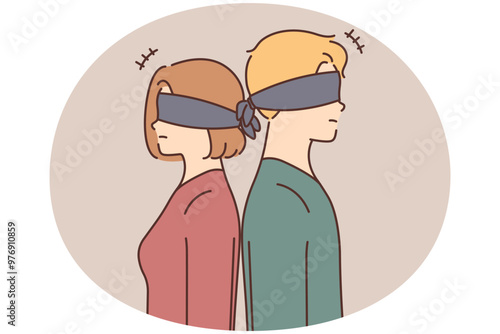 Blindfolded couple stand back to back