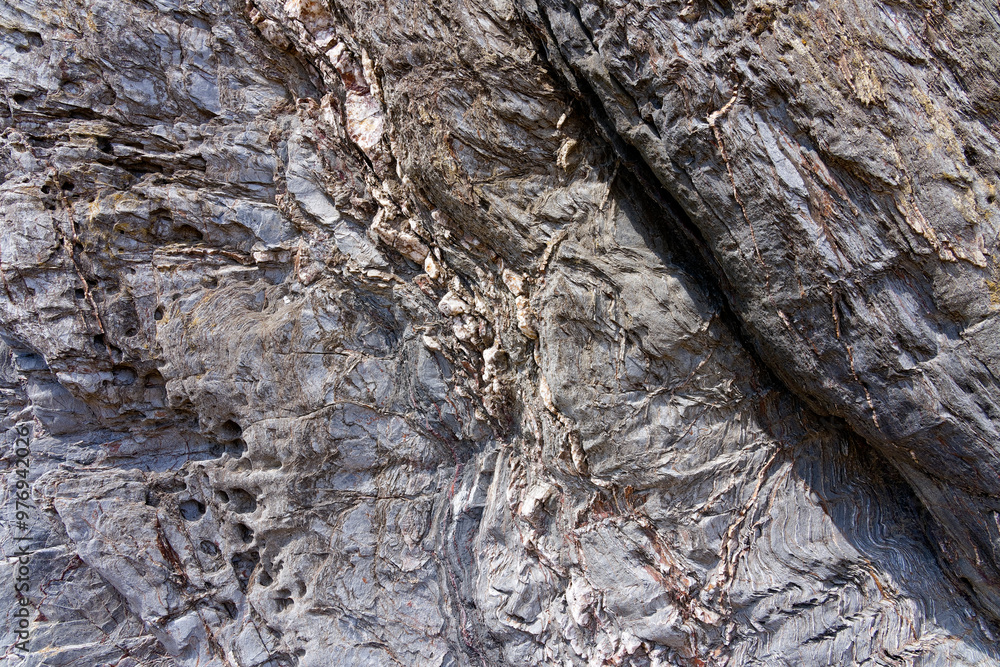 Close up of eroded lava rock found on Hemmick beach in Cornwall. Close up of eroded lava rock found on Hemmick beach in Cornwall.