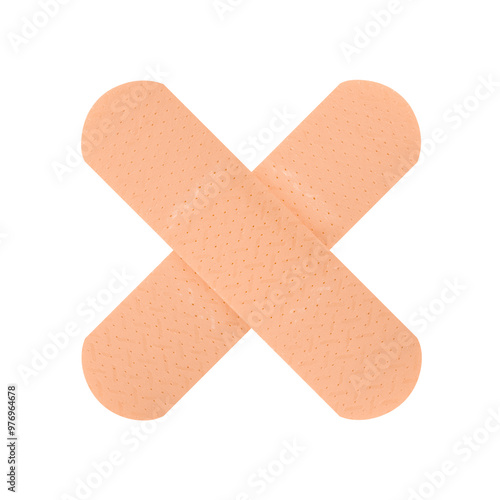 Two plasters in the shape of a cross isolated on a transparent background. Stock photo