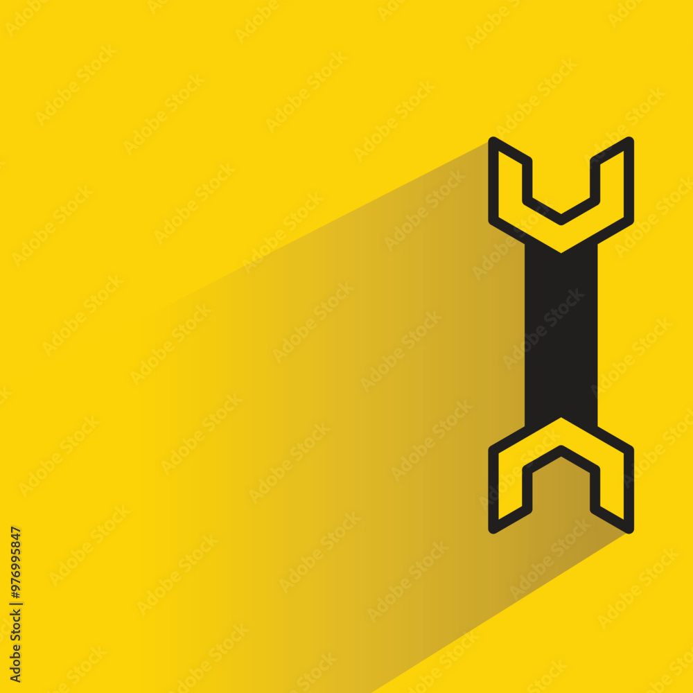 wrench tool icon with shadow on yellow background wrench tool icon with shadow on yellow background