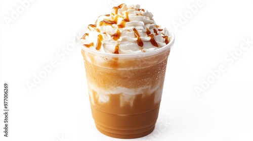 A cold vanilla frappuccino in a plastic cup, topped with whipped cream and caramel drizzle, on white. photo